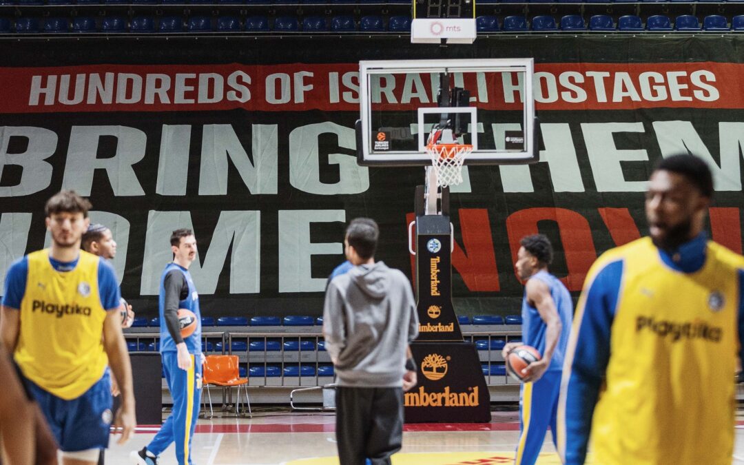Maccabi Tel Aviv Hosts Barcelona in Belgrade with massive Bring Them Home Now banner in the stands
